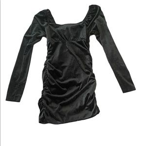 Satin-like rouged dress. Black, great for Holliday parties or nights out.